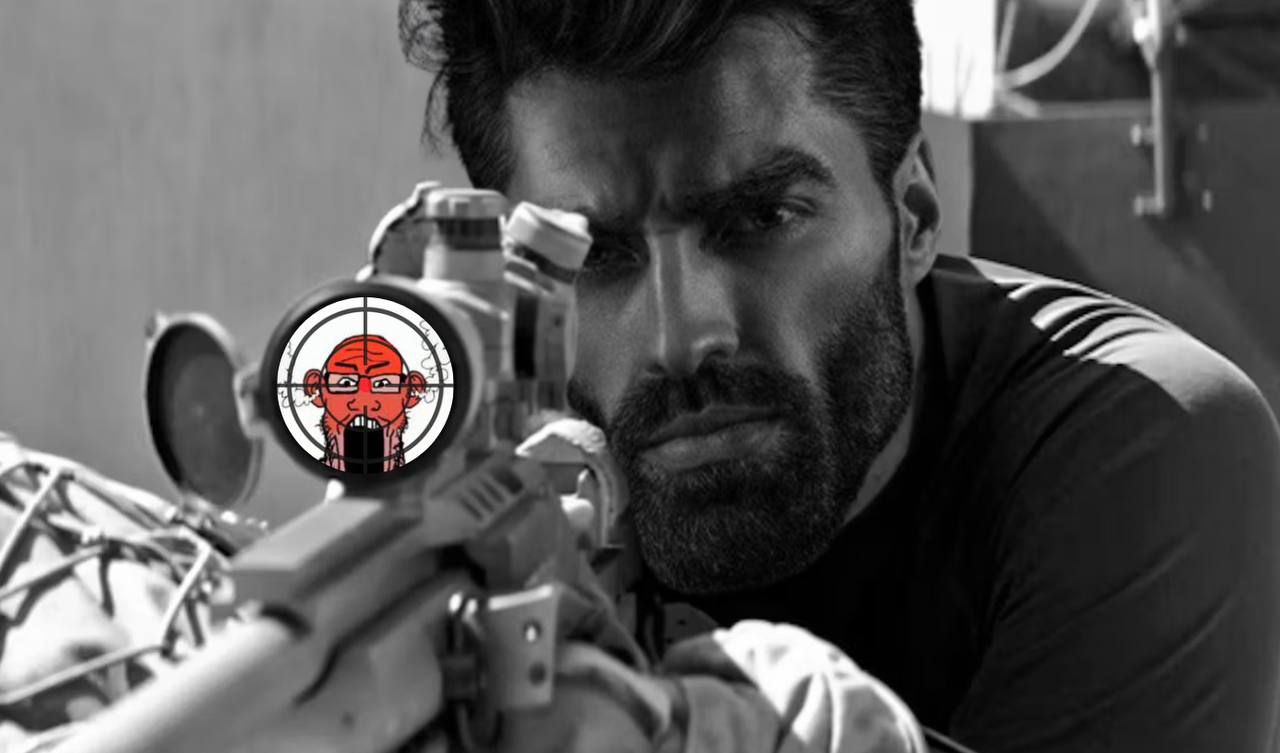 A man aiming a sniper rifle with a cartoon face in scope.